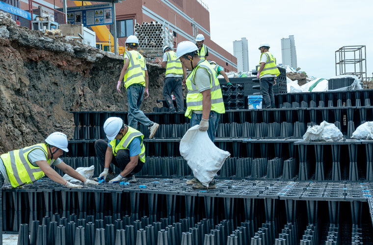 正在上传... Close-up view of polypropylene stormwater storage modules with interlocking structural connections