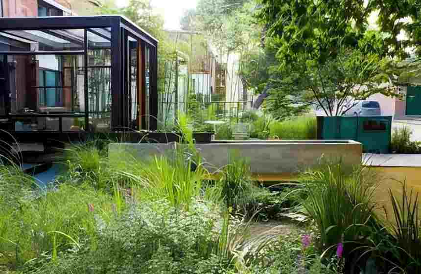 正在上传... Lush green rain garden landscape demonstrating the end-use of filtered harvested rainwater